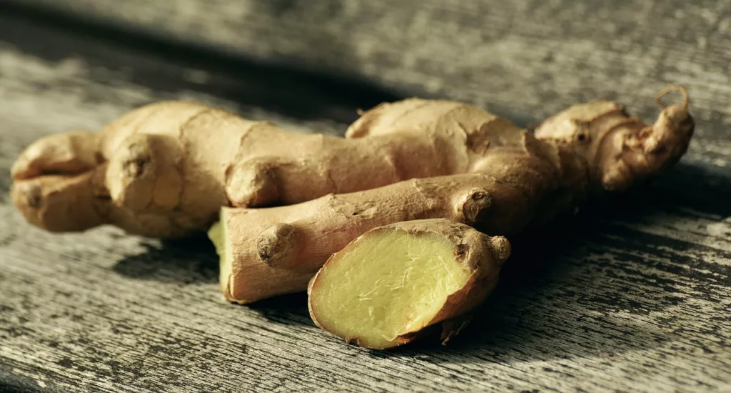 ginger cut in the corner in a dark background